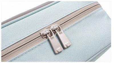 Trousse de toilette voyage femme à suspendre turquoise - À vos trousses